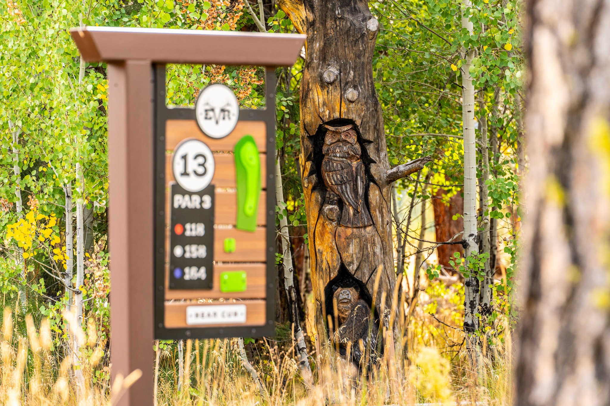 Hole 13 sign beside the golf course