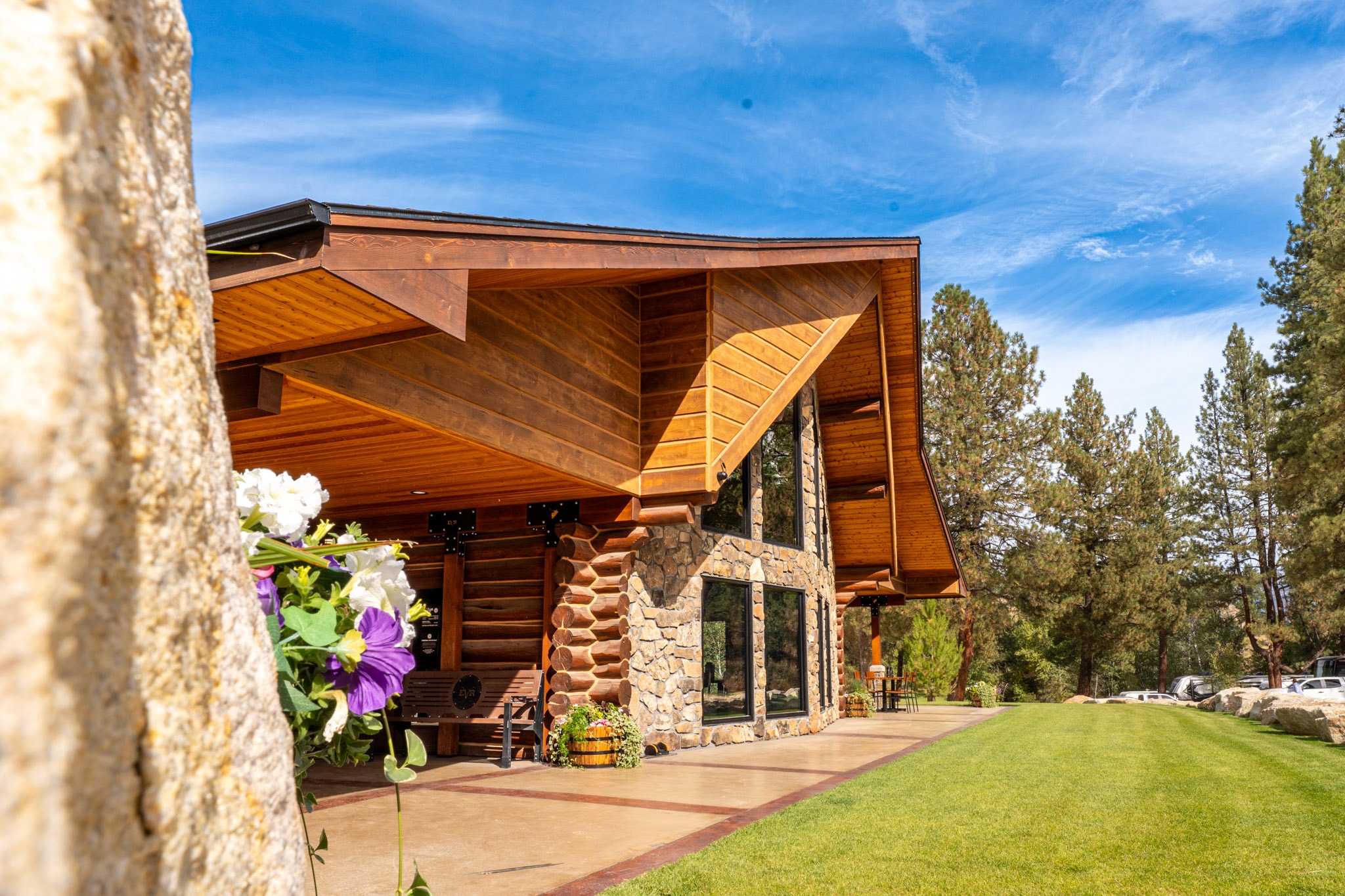 Lodge entrance framed by flowers