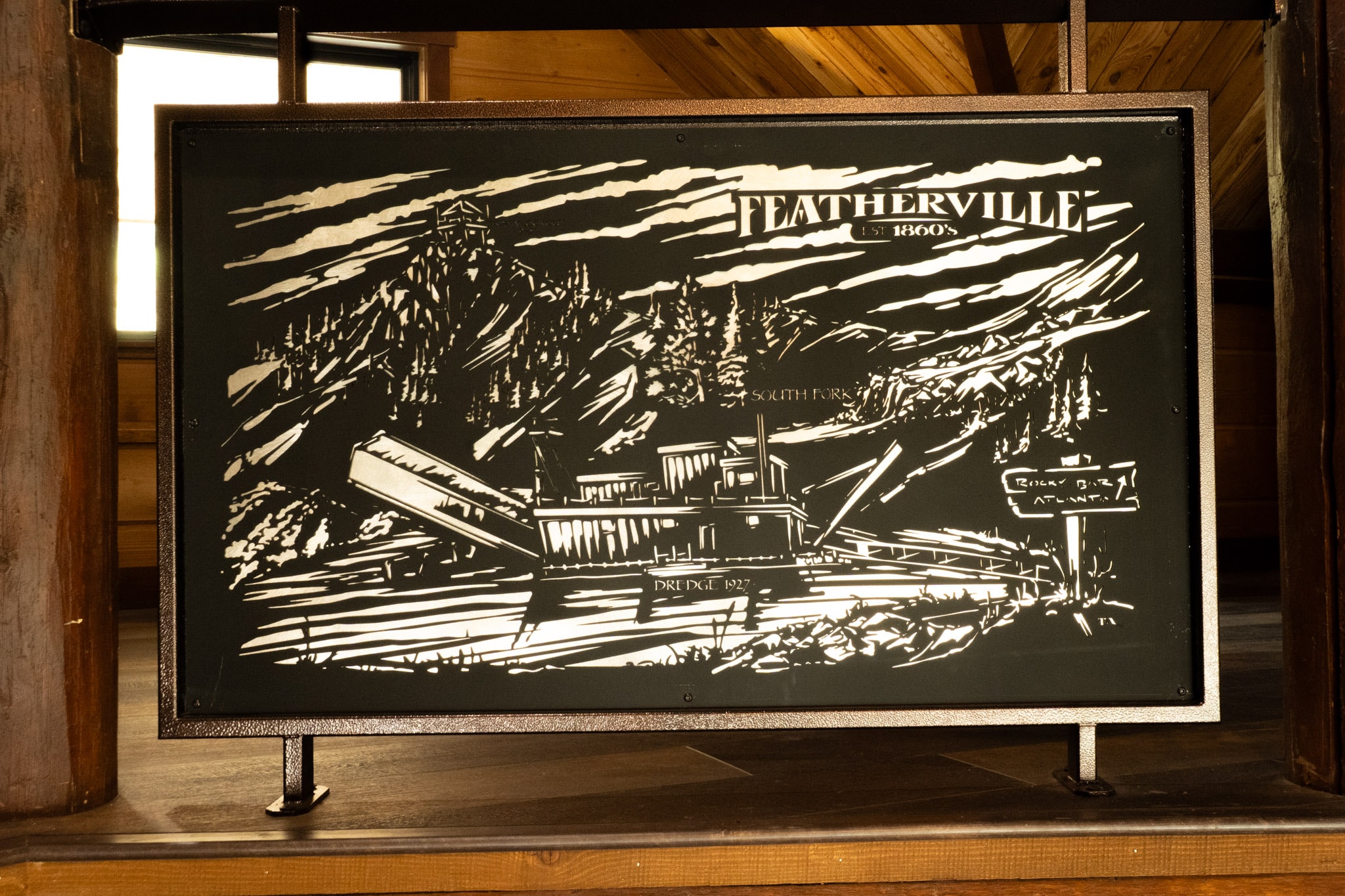 Local mountain artwork on a lodge wall