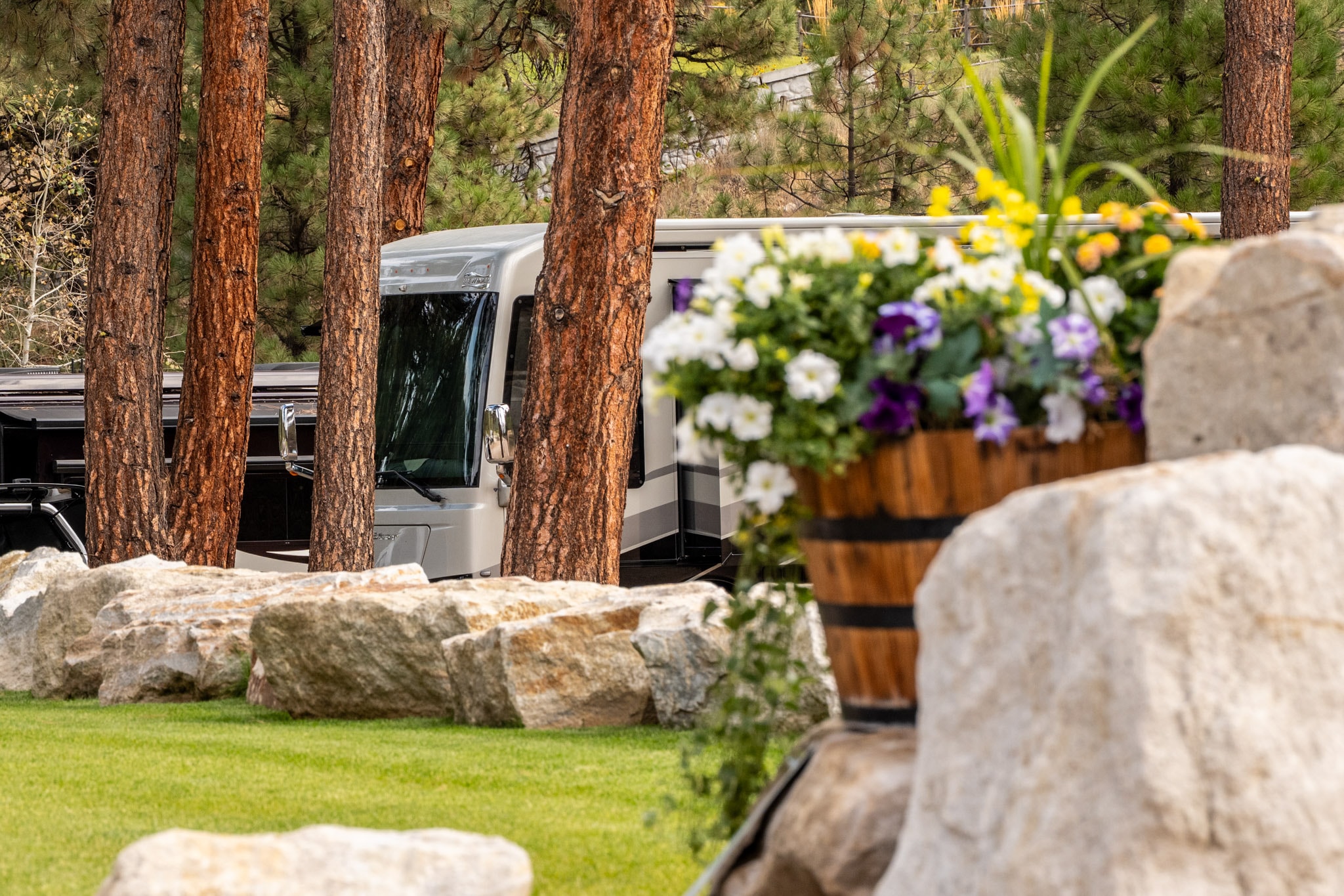 Flowers and landscaping beside an RV site