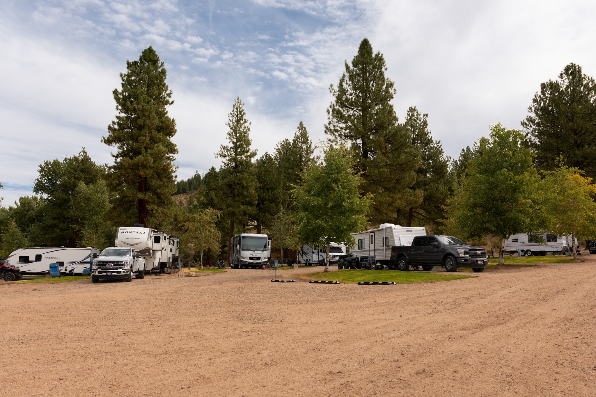 Row of RV sites beside the gravel drive