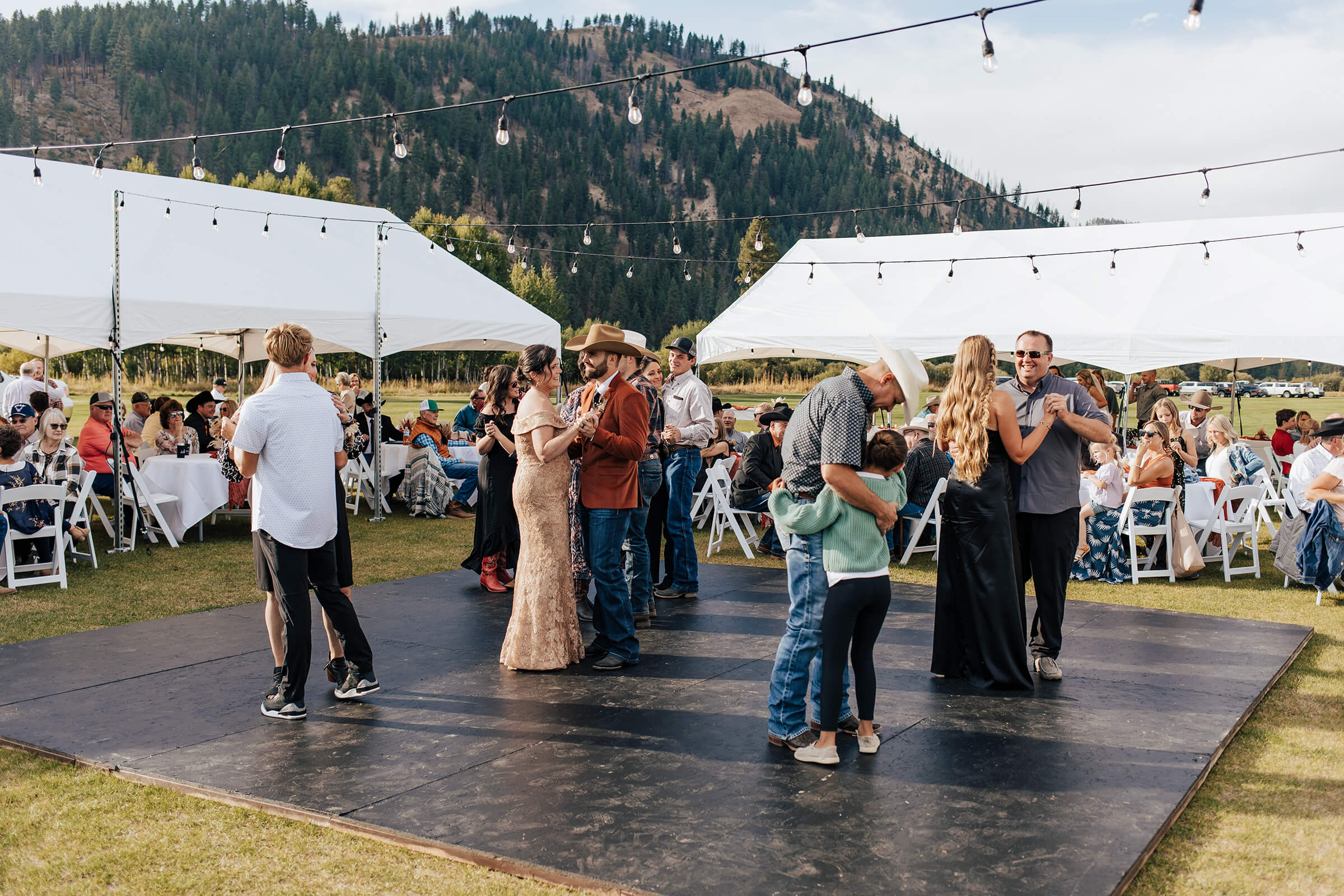 Wedding party celebrating outdoors